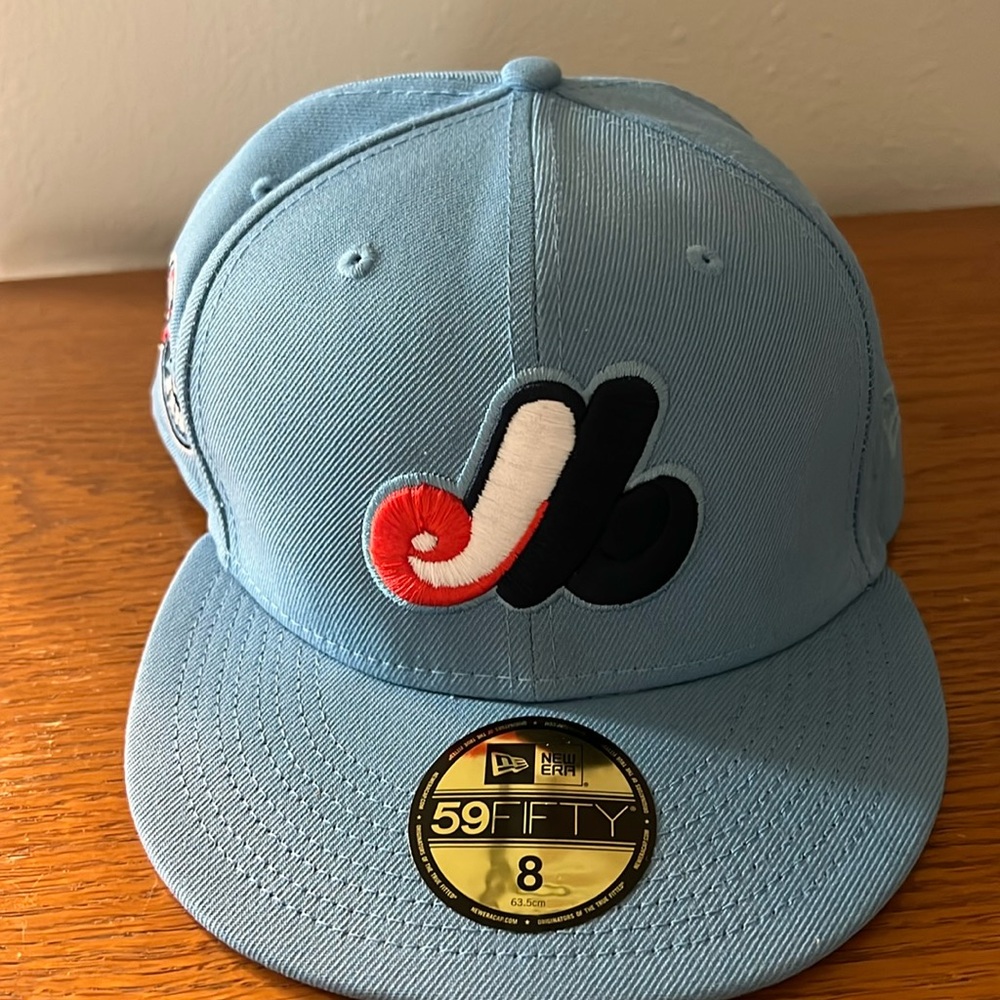 Montreal Expos Sky Blue Purple Bottom 25th Anniversary Fitted Hat.